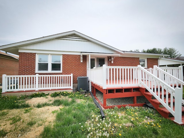 1322 S David Ave, Covington, VA 24426 - exterior space with brick siding, central AC unit, and a deck