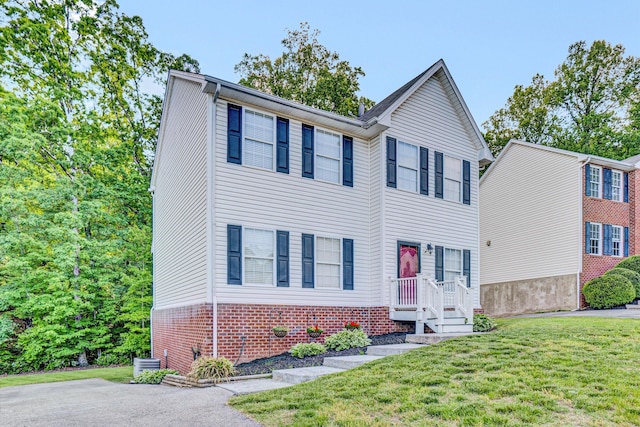 1920 Connors Ct, Salem, VA 24153 - traditional-style house with a front lawn, central AC unit, and brick siding
