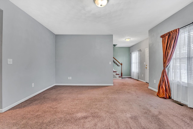 1920 Connors Ct, Salem, VA 24153 - unfurnished living room with stairway, carpet flooring, and baseboards