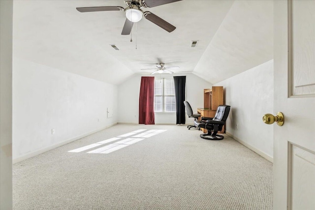 unfurnished room with baseboards, vaulted ceiling, visible vents, and carpet