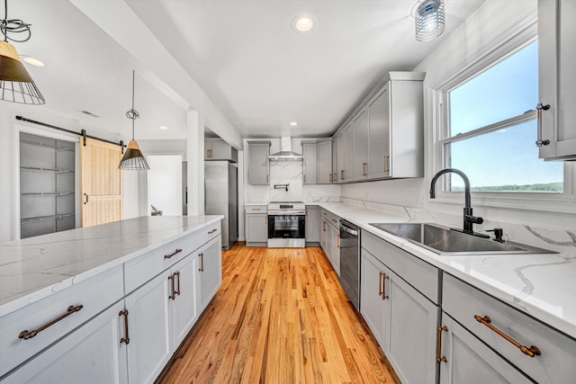 2288 Mud Pike Rd, Christiansburg, VA 24073 - kitchen with light wood finished floors, recessed lighting, a sink, stainless steel appliances, and gray cabinetry