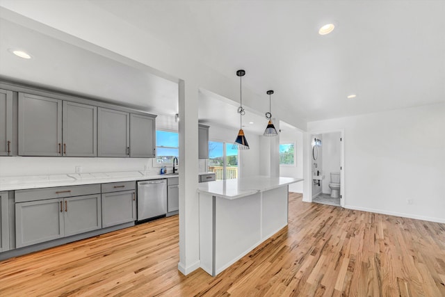 2288 Mud Pike Rd, Christiansburg, VA 24073 - kitchen featuring decorative light fixtures, gray cabinetry, dishwasher, and light wood-style flooring