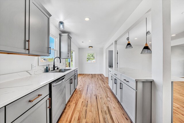 2288 Mud Pike Rd, Christiansburg, VA 24073 - kitchen featuring a sink, gray cabinets, light wood-style flooring, baseboards, and stainless steel dishwasher