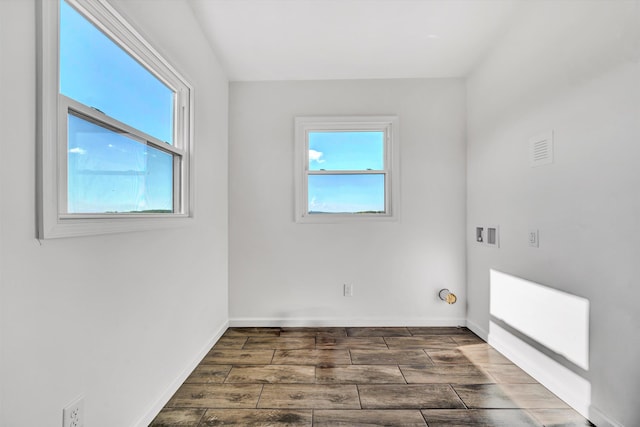 2288 Mud Pike Rd, Christiansburg, VA 24073 - washroom featuring visible vents, baseboards, hookup for a washing machine, wood finished floors, and laundry area