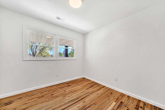 2288 Mud Pike Rd, Christiansburg, VA 24073 - empty room with visible vents, light wood-style flooring, and baseboards