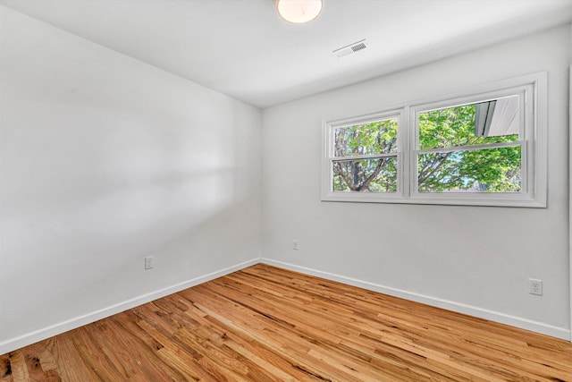 2288 Mud Pike Rd, Christiansburg, VA 24073 - spare room with baseboards, visible vents, and wood finished floors