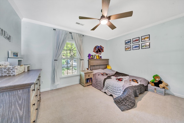 carpeted bedroom featuring crown molding, baseboards, ceiling fan, and visible vents
