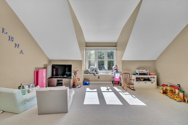 rec room with carpet flooring and vaulted ceiling
