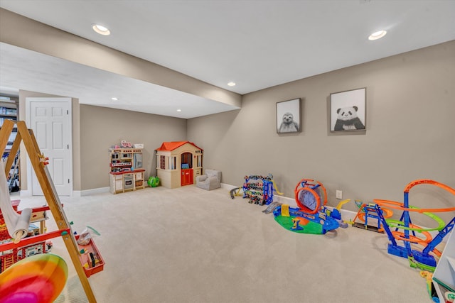 recreation room featuring recessed lighting, carpet, and baseboards