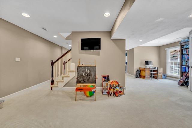 rec room with recessed lighting, baseboards, visible vents, and carpet
