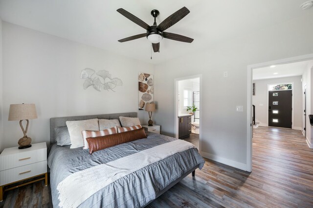 101 Retreat Ln, Huddleston, VA 24104 - bedroom featuring ceiling fan, baseboards, multiple windows, and wood finished floors