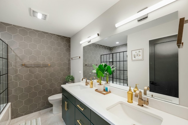 bathroom with tile patterned floors, visible vents, a sink, and toilet