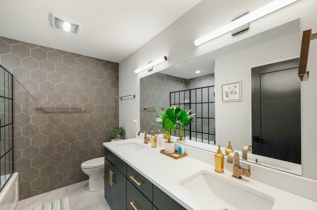 101 Retreat Ln, Huddleston, VA 24104 - bathroom with tile patterned floors, visible vents, a sink, and toilet