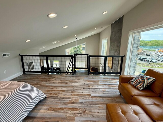 101 Retreat Ln, Huddleston, VA 24104 - bedroom with lofted ceiling, wood finished floors, visible vents, and recessed lighting