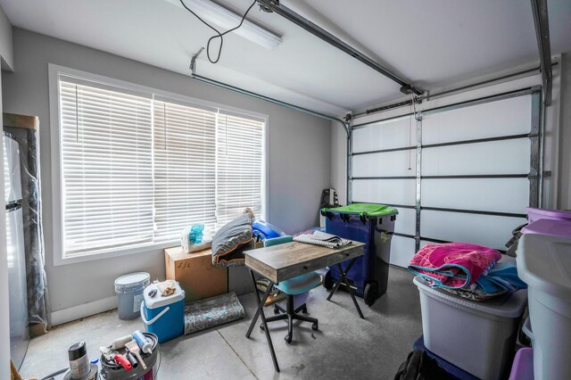 101 Retreat Ln, Huddleston, VA 24104 - garage with freestanding refrigerator