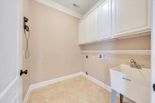 washroom featuring hookup for an electric dryer, washer hookup, crown molding, a sink, and cabinet space