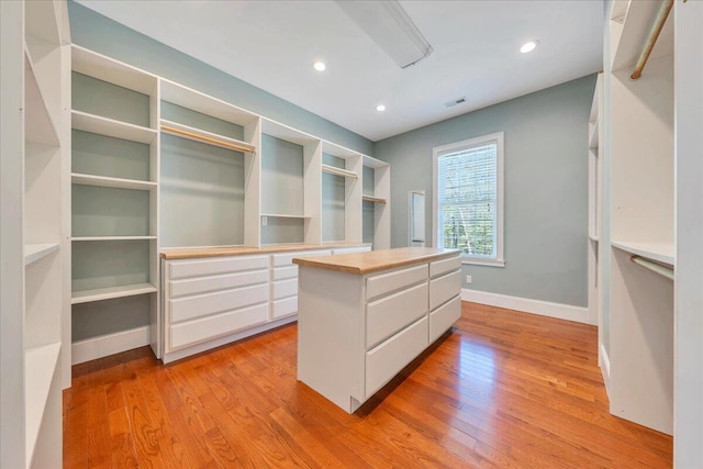 walk in closet featuring visible vents and light wood-type flooring