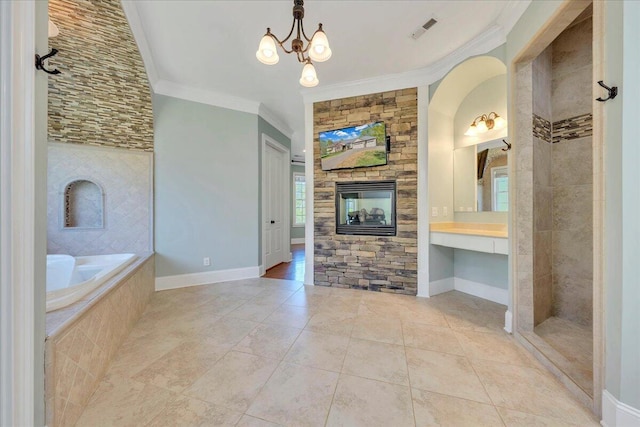 bathroom featuring a garden tub, a notable chandelier, visible vents, ornamental molding, and tile patterned flooring