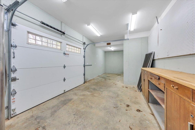 garage with a workshop area
