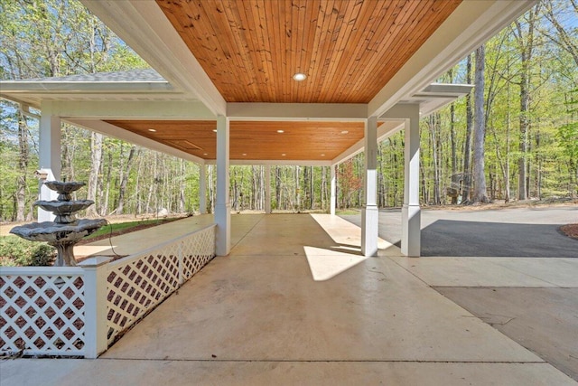 view of patio / terrace featuring a forest view