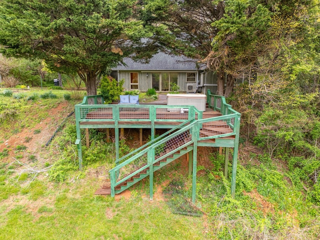 exterior space with a deck and stairs