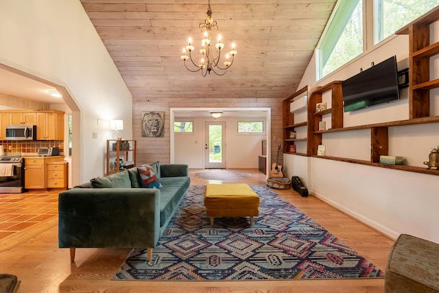 living area featuring arched walkways, wooden ceiling, a chandelier, and lofted ceiling
