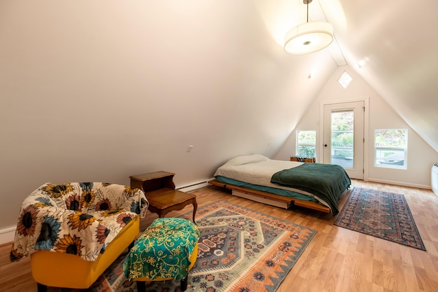 bedroom with access to outside, light wood-type flooring, baseboards, lofted ceiling, and a baseboard radiator