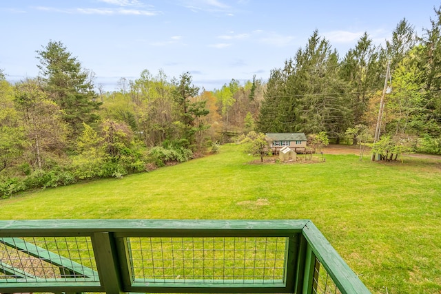 view of yard with a wooded view