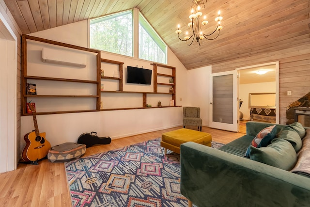 living area with wood ceiling, a notable chandelier, a wall unit AC, and light wood-type flooring