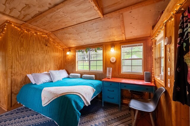 bedroom with wooden walls, wooden ceiling, and lofted ceiling