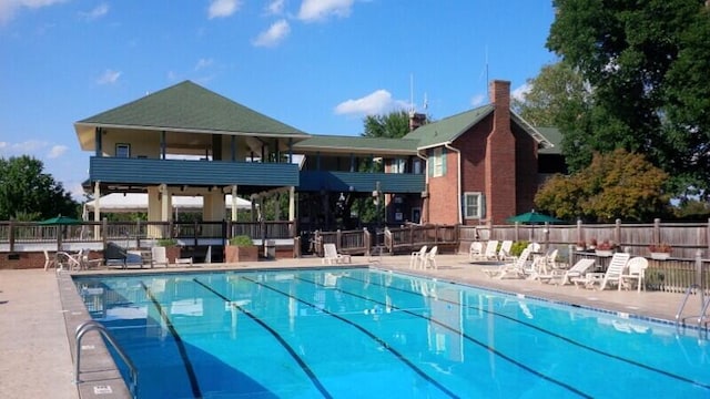 100 Sailors Cove Dr Unit 1319, Moneta, VA 24121 - pool with a patio area and fence