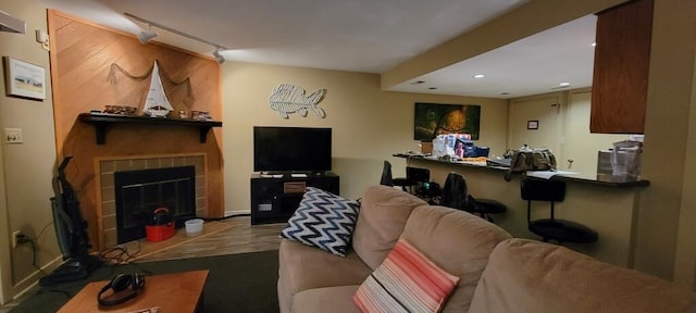 100 Sailors Cove Dr Unit 1319, Moneta, VA 24121 - living room with a fireplace, recessed lighting, wood finished floors, and baseboards