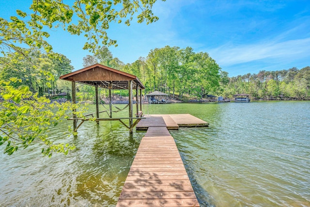 view of dock with a water view