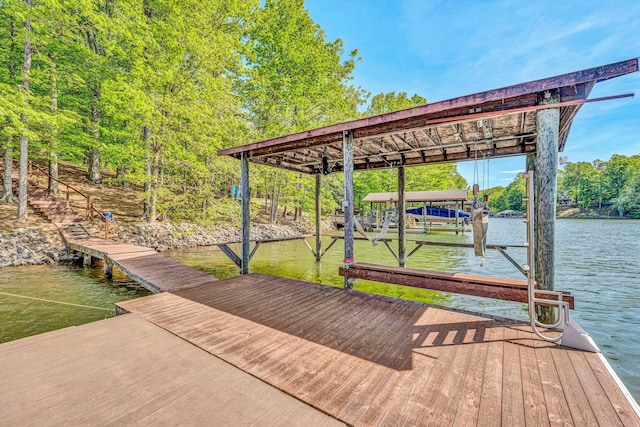 dock area featuring a water view