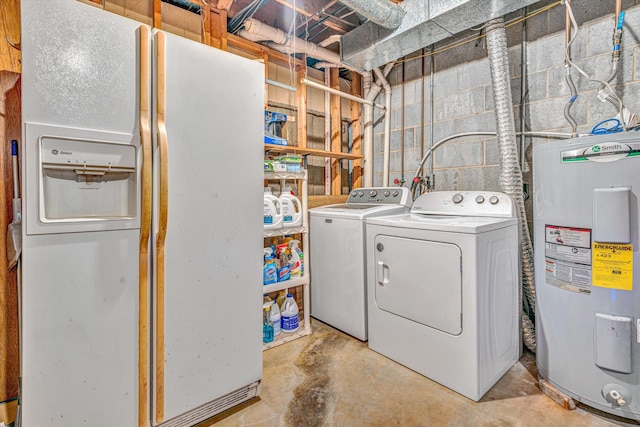 washroom featuring washer and clothes dryer, water heater, and laundry area