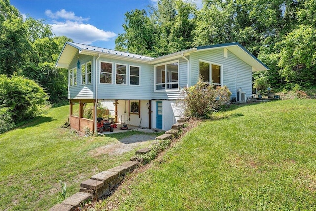 712 Baltimore Ave, Bedford, VA 24523 - rear view of property with a yard, a patio area, and metal roof