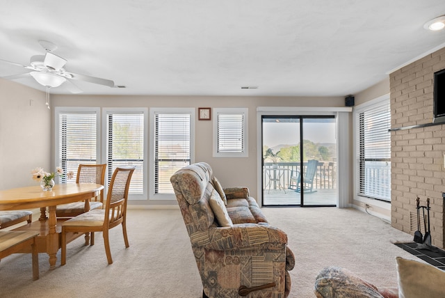 75 Dockside Cir Unit 308, Moneta, VA 24121 - living room with a brick fireplace, light colored carpet, and a healthy amount of sunlight