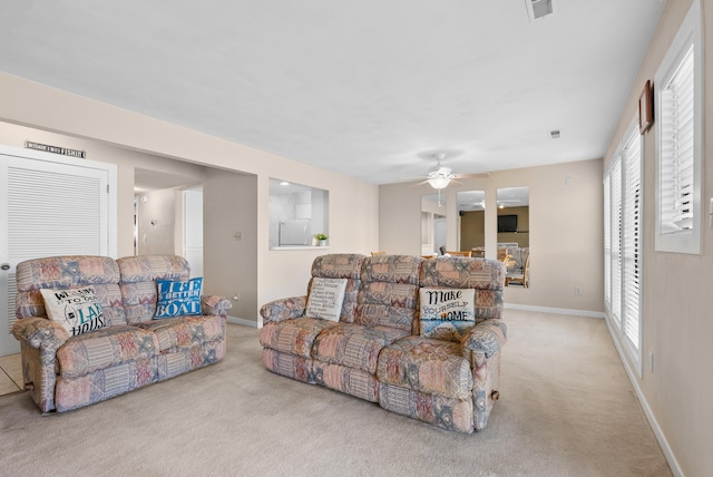 75 Dockside Cir Unit 308, Moneta, VA 24121 - living room with baseboards, a ceiling fan, and carpet flooring