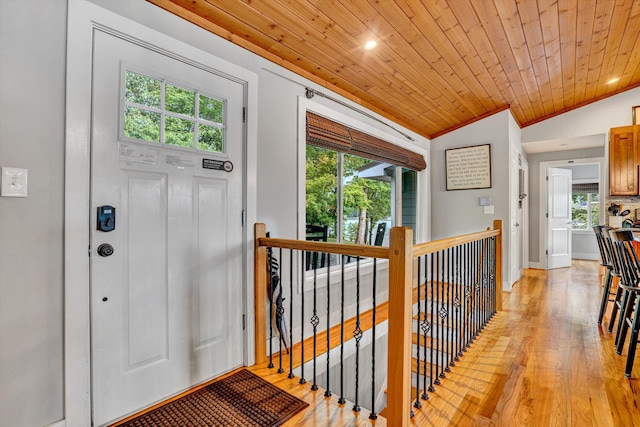 511 Autumn Ave, Huddleston, VA 24104 - foyer with light wood-style floors, vaulted ceiling, crown molding, wood ceiling, and baseboards