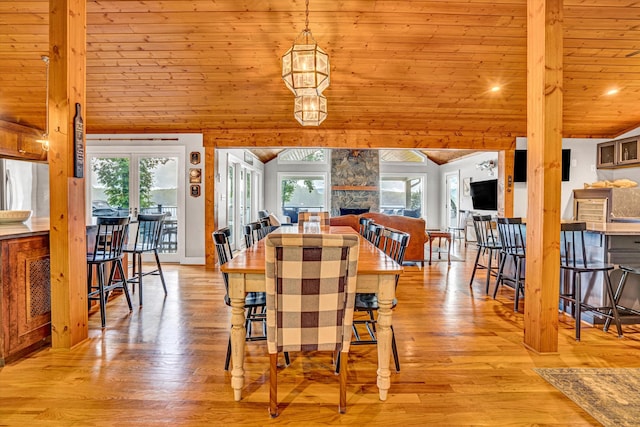 511 Autumn Ave, Huddleston, VA 24104 - dining space with vaulted ceiling, wood ceiling, healthy amount of natural light, and light wood-style flooring