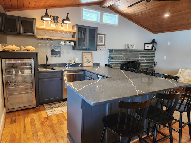 511 Autumn Ave, Huddleston, VA 24104 - kitchen with wine cooler, wood ceiling, a sink, a peninsula, and dishwasher