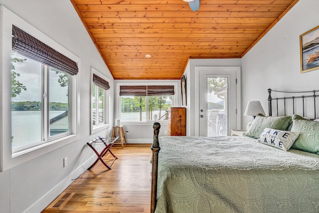 511 Autumn Ave, Huddleston, VA 24104 - bedroom with lofted ceiling, wooden ceiling, multiple windows, access to outside, and wood finished floors