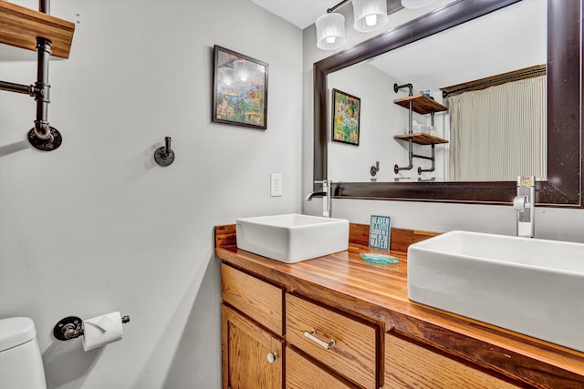 511 Autumn Ave, Huddleston, VA 24104 - full bath with double vanity, toilet, and a shower with curtain