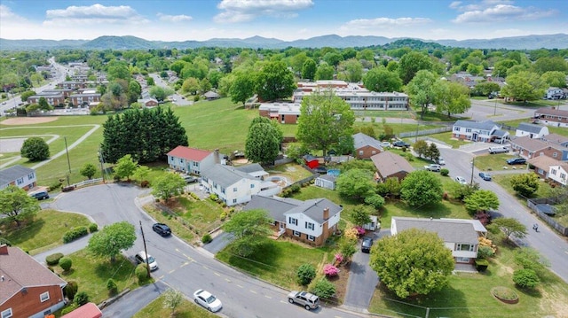 birds eye view of property featuring a mountain view and a residential view