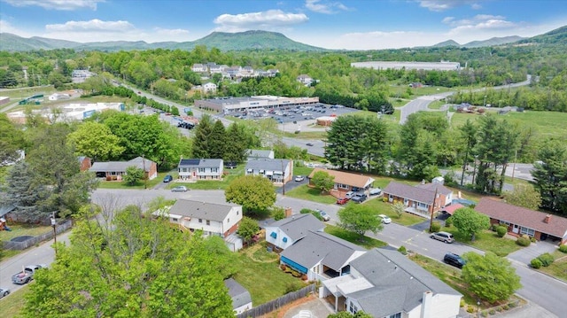 drone / aerial view with a residential view and a mountain view