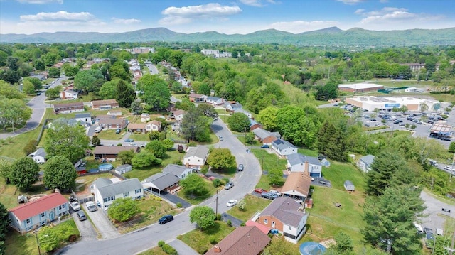 drone / aerial view featuring a mountain view