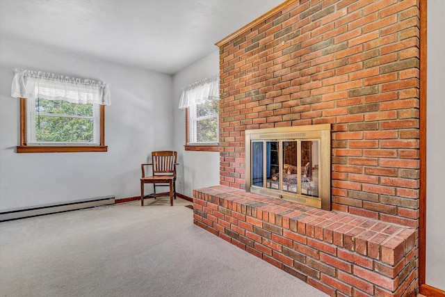 living area with carpet floors, a baseboard radiator, and baseboards