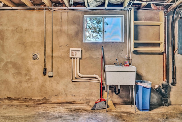 basement featuring a sink
