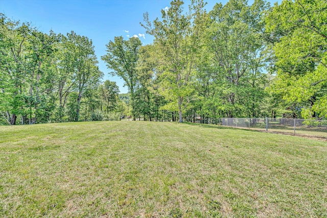 view of yard featuring fence