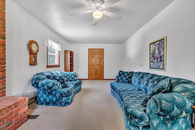 living room featuring carpet flooring, ceiling fan, baseboard heating, brick wall, and baseboards